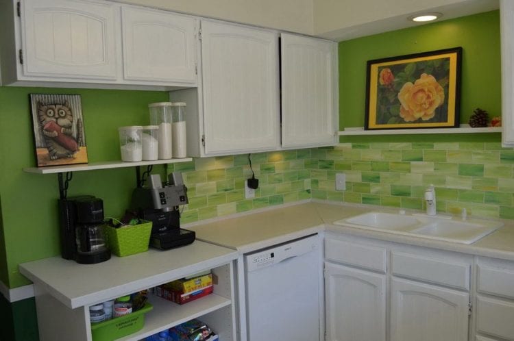 green kitchen backsplash white countertops