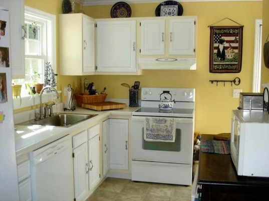 Small kitchen with yellow wall