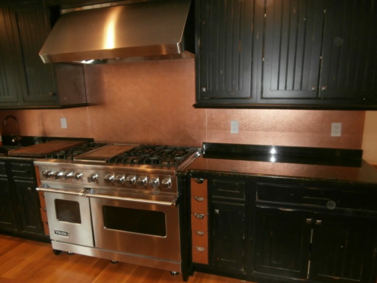 Black Kitchen Cabinet with Copper Backsplash