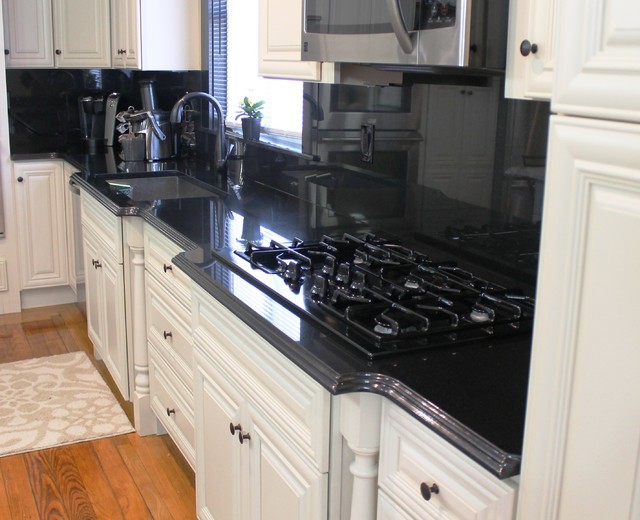 Absolute Black Granite Countertop, Backsplash, and Walls