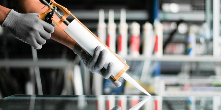 Apply silicone adhesive
