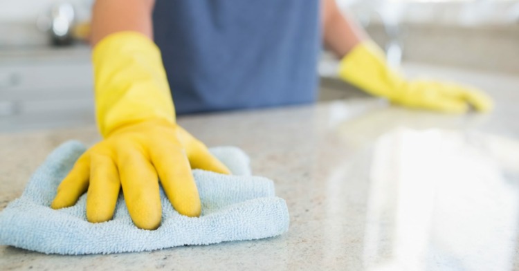 Clean the countertop surface