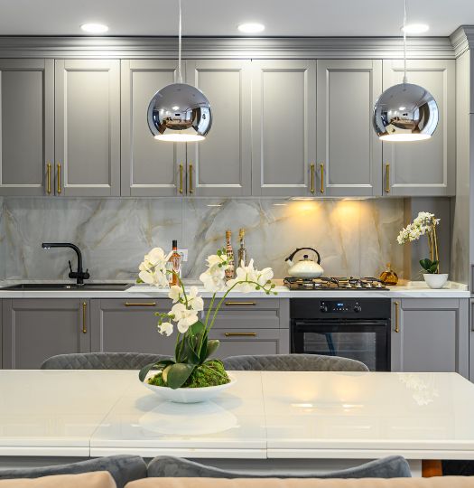 black appliances in grey kitchen