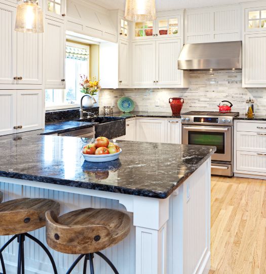 kitchen peninsula with black countertops